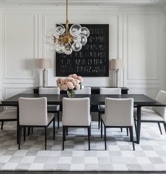 a dining room with a chandelier chandelier and a chandelier