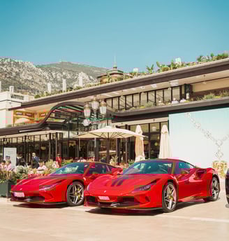 Exotic cars in front of a restaurant during the Monaco Grand Prix