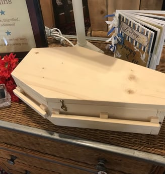Furniture mixed with Coffins yes that's  Old West Coffins