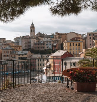 view with 'I ❤️ BOGLIASCO' planter - terracotta rooftops - church spire - Maa Beach background