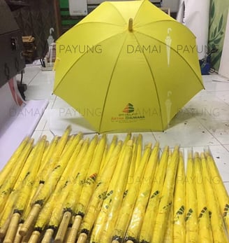 Payung promosi polos standard kuning artha bhuwana