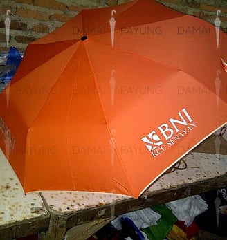Payung promosi polos lipat orange silver BNI