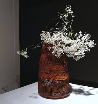 Sogetsu Ikebana arrangement by Hedy Leung, displayed in a basket by Maeda Chikubosai II at Design Miami, Messe Basel, Basel