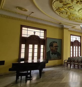 a room with a piano and chairs and a piano, teatro lirico nacional de Cuba