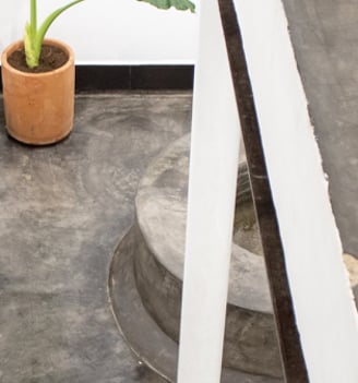 a potted planter with a potted plant in it
