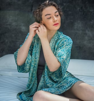A WOMAN IN BIKINI WITH CAPRI KIMONO KAFTAN BLUE LOUNGE STYLE