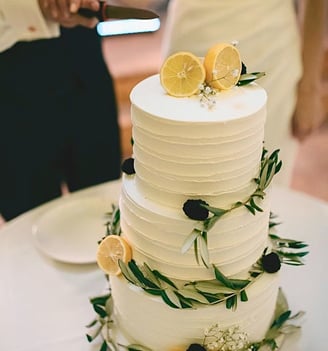 a wedding cake with lemonade and lemon slices