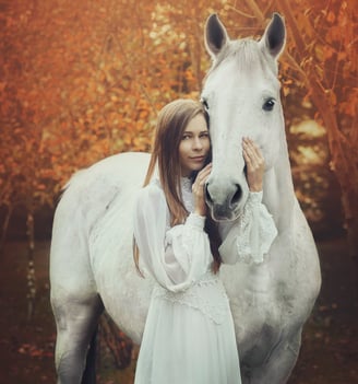 White horse and girl fall photo shoot