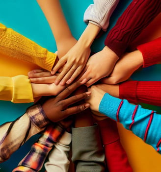 a group of people holding hands together in a circle