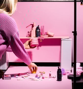 blonde girl styling pink beauty related photography scene