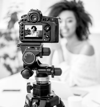 A Canon Camera shooting a Beauty Influencer who is behind the camera