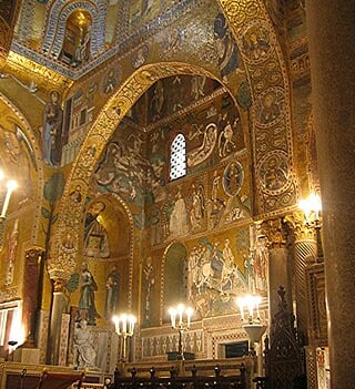 Arabic arches and Byzantine mosaics in the Cappella Palatina of Roger II of Sicily.