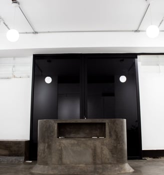 a concrete bathtub with a concrete bathtub and a concrete bathtub