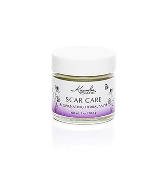 a jar of scar herbal salve