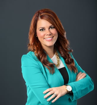 kate in a blue blazer and black pants