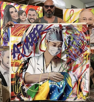 a man holding a painting of a woman with a mask on