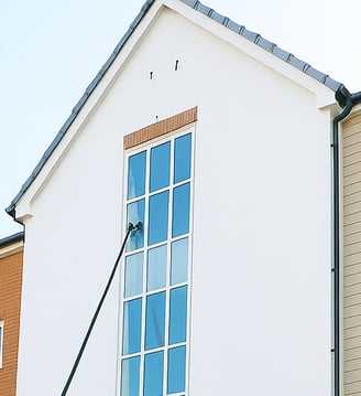 window cleaning using a pole brush