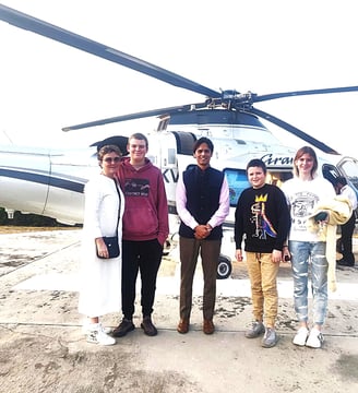 Muzammil (in the center) leading an exotic tour of Agra and Jaipur for a family travelling on their Private Jet
