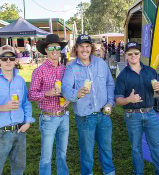 Four men enjoying the Nanango Races