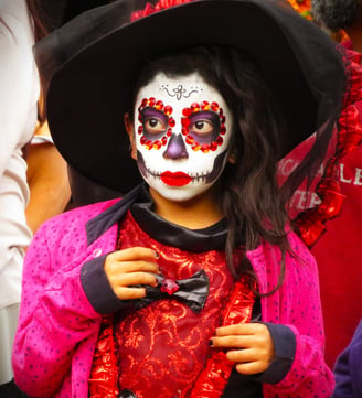 a woman in a costume with a hat and a hat