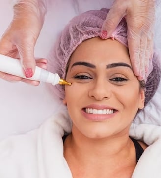 a woman having a skin treatment at an aesthetic clinic