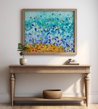 a colorful abstract painting of a wave on a beach