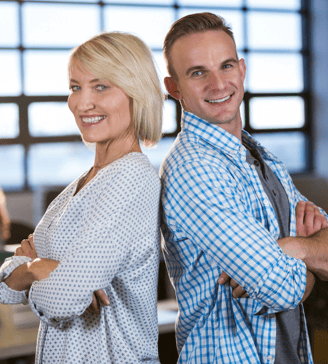 a man and woman standing in a room