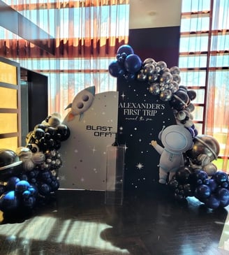 First trip Space themed balloon backdrop rental
