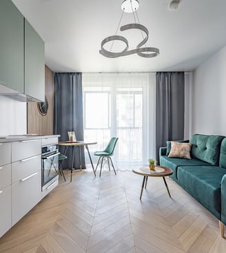 a living room with a couch and a table