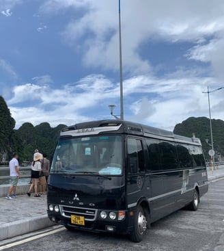 How much does it cost to rent a 16-seat car to go to the province from Hanoi?