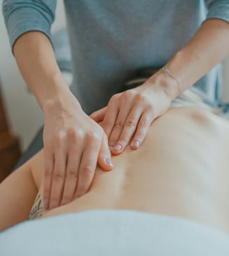 a woman receiving massage by daniel