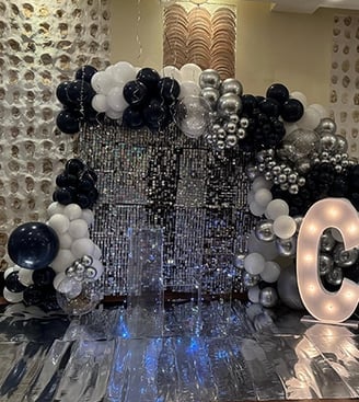 a large number of balloons and balloons in a room