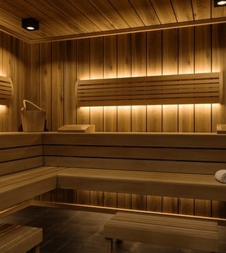 L'intérieur d'un sauna proposée dans la résidence