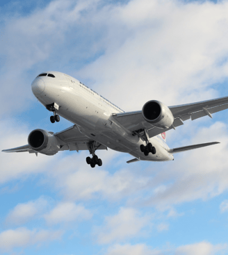 a large jetliner flying through the air