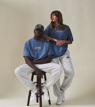 Flat lay product photography of custom t-shirts and hoodies for eCommerce