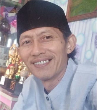 a man in a black hat and a blue shirt