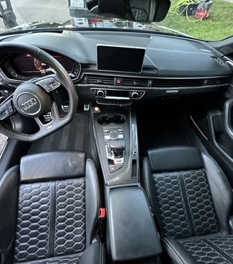 Interior Detailing Image “Deep interior car detailing with steam cleaning and vacuuming of seats"