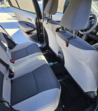 Interior Detailing Image “Deep interior car detailing with steam cleaning and vacuuming of seats"