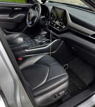 Interior Detailing Image “Deep interior car detailing with steam cleaning and vacuuming of seats"