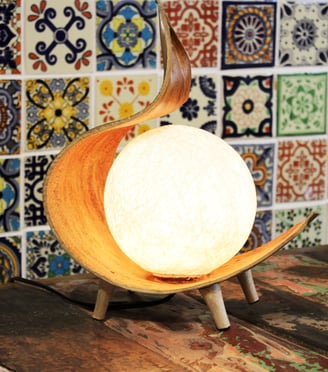 a wooden table with a wooden bowl on it