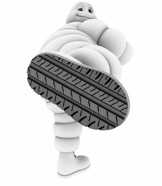 michelin tyre man in a nigerian tyre shop