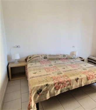 a bed with a couch and a couch