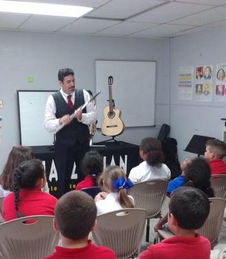 Jazz flutist Maestro Bobby Ramirez teaching kids jazz history