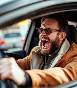Man having with road rage screaming