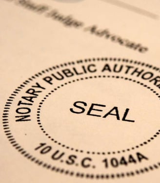 mobile notary signing document in Broomfield
