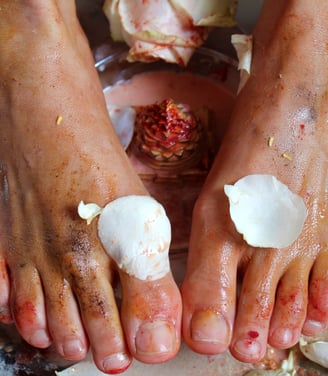 woman's feet being worshipped in tantric ritual