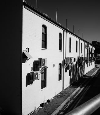 houses with air conditions on their walls