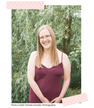 blonde woman in a burgundy dress - owner of a pop of colour designs