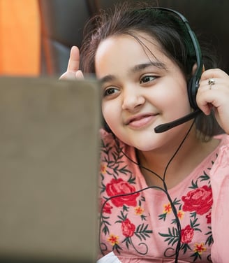 a girl with headphones and a headset on her headphones