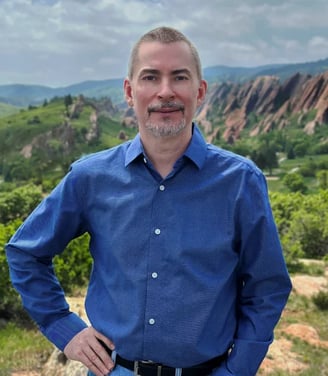 Christopher Wilson smiling, founder of Cilson Bookkeeping, Colorado